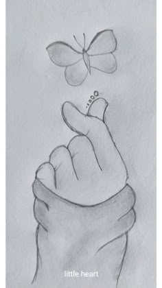 a drawing of a hand holding a butterfly