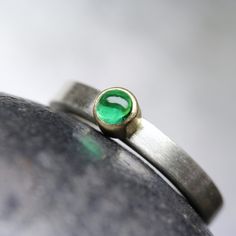 Modern Colombian Emerald Engagement Ring Solid Silver 18K Yellow Gold Minimalistic Green Cabochon - Beryl Dome by NangijalaJewelry on Etsy Modern Polished Emerald Jewelry, Modern Emerald Ring Jewelry, Modern Polished Rings With May Birthstone, Modern Round Emerald Ring For Formal Occasions, Everyday Green Emerald Ring With Bezel Setting, Modern Emerald Ring With Polished Finish, Modern Emerald Gemstone Ring For Wedding, Modern Emerald Ring For Wedding, Modern Emerald Cut Emerald Ring With Bezel Setting