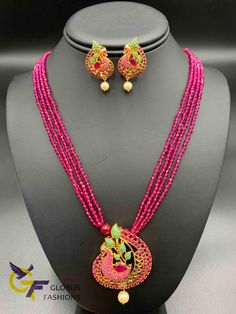 Cute multicolor stones Peacock design pendant with matching pink beads chain Handmade jewelry One gram gold jewelry Silver-plated jewelry Official Website globusfashions.com 🌸 S H O P . M O R E . S T Y L E S 🌸 https://www.etsy.com/shop/Globusfashions Necklaces - https://www.etsy.com/shop/Globusfashions?section_id=18712263 Bracelets - https://www.etsy.com/shop/Globusfashions?section_id=18969767 Pendant Sets - https://www.etsy.com/shop/Globusfashions?section_id=18707402 Tikka - https://www.etsy. Festive Multicolor Gemstone Beads Jewelry, Festive Pendant Jewelry With Beaded Chain, Traditional Pink Jewelry With Colorful Beads, Beaded Pendant Jewelry For Festivals, Festive Beaded Pendant Jewelry, Pink Gemstone Beads Necklace For Wedding, Pink Beaded Necklace For Festivals, Multicolor Gold Beads Jewelry For Celebration, Traditional Pink Necklaces With Colorful Beads