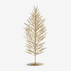 a gold christmas tree on a white background