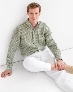 "Men's classic lightweight linen shirt WENGEN in Forest green gingham is a wardrobe staple both for formal and casual dressing. It has all the design details of a classic shirt, therefore you can include this shirt into your office outfits. Made from lightweight breathable linen fabric this shirt is also a perfect choice for laid-back summer days. You can wear this shirt open or buttoned down, tucked into linen pants or loose, with the sleeves rolled up or down. Details: * Button-down point collar * Buttoned placket * Long sleeves with buttoned barrel cuffs * Split back yoke * Regular fit * Lightweight linen (approx. 135 gsm) * The model is wearing a forest green gingham shirt in size M (Paired with white pants TRUCKEE in size M) and is 6'1\" (187cm) tall. Model measurements: Bust: 37\"/94 Spring Plaid Linen Shirt, Classic Plaid Linen Shirt, Long Sleeve Linen Shirt, Wrinkled Clothes, Linen Men, Green Gingham, Gingham Shirt, Chambray Shirt, Clothing Care