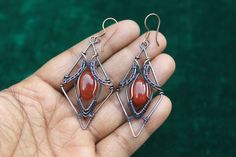 Excellence Dangle Copper Wire Wrap Earrings, Beautiful Red Chalcedony Earrings, Banjara Tribal Look Earrings Jewelry, Christmas Gift Jewelry ITEM DETAILS  Item Type ~ Earrings Gemstone  Name - Chalcedony  Earrings Style - Dangle   Earrings Height - 7.4 Centimeter  Earrings Width - 3.2 Centimeter Metal ~ Copper Wire  Quantity ~ 1 Piece Red Wire Wrapped Metal Earrings, Copper Wrap Earrings As A Gift, Unique Red Wire Wrapped Earrings, Unique Red Wire-wrapped Earrings, Unique Red Hoop Earrings For Gift, Handmade Red Plug Earrings As Gift, Red Copper Earrings As Gift, Red Copper Drop Earrings, Red Copper Earrings Gift