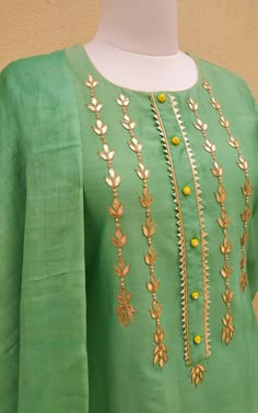 Pure Silk Chanderi Kurta with Gota Patti handwork on front Lime potli button detailing on neck Hand block printed fine Tussar Potli Button, Silk Kurti Designs, Design Kurta, Salwar Neck Designs, Gota Patti Work, Kurti Sleeves Design, Kurti Embroidery, Hand Embroidery Dress, Silk Kurti