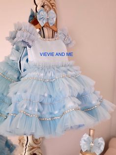 Princess Light Blue Pageant Dress, Light Blue Embellished Tulle Dress, Light Blue Elegant Dress For Dress-up, Elegant Light Blue Dress For Dress-up, Elegant Light Blue Dress For Dress-up Occasions, Blue Princess Pageant Dress With Ruffles, Princess Style Blue Pageant Dress With Ruffles, Light Blue Pageant Dress With Ruffles, Light Blue Ruffled Dress For Pageant