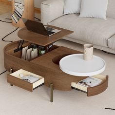 a coffee table with two drawers and a laptop on it