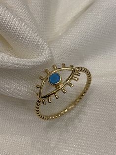 "ABOUT PRODUCT This 14K Gold Evil Eye Ring is beautifully designed and hand crafted with our associates to make this a special gift for your loved ones. Knowing the value of our customers, We prepare each piece with extra care and attention. ITEM DETAILS Material: 14K Gold Approx: 1.25 gram Available colors: Gold, Rose Gold, White Gold Available Sizes: 4 US to 11 US ✪ 14k Solid Gold ( Certification will be included with your order ) ✪Available 14K White, Yellow, Rose Gold (also in 10, 18K) 🛠 Ya Unique Handmade Stackable Rings As Gift, Unique Stackable Midi Rings As Gift, Unique Handmade Stackable Rings For Gift, Handmade Symbolic Yellow Gold Rings, Symbolic Handmade Yellow Gold Rings, Bohemian 14k Gold Ring As A Gift, Bohemian 14k Gold Rings As Gift, Handmade Blue Open Ring, Fine Jewelry Rings With Evil Eye For Gifts