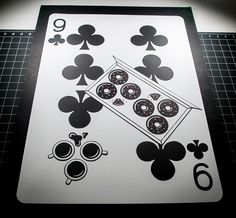 a playing card with fours and sixs on it