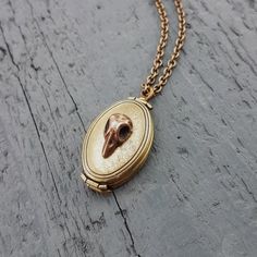 Vintage Brass Jewelry With Patina, Handmade Oval Brass Locket Necklace, Engraved Brass Jewelry For Vintage Collection, Handmade Antique Bronze Locket Necklace, Handmade Antique Gold Locket Necklace, Handmade Brass Gold Locket Necklace, Vintage Antique Gold Jewelry With Patina, Handmade Gold Brass Locket Necklace, Vintage Gold Jewelry With Patina