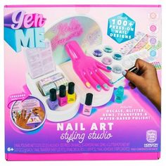 Become a mini manicurist and get salon-quality nails at home with the GenMe Nail Art Styling Studio! Practice your painting skills on 100 press-on nails — just place them on the manicure hand station, then paint and embellish away! Choose from 5 vibrant polishes, glitter, gemstones and nail decals to achieve your signature look. Use the mini tweezers to dip your nail into glitter, decorate with nail tattoos, or apply nail stickers exactly where you want. When you’re done, pop the nails off the m Nail Kit For Kids, Kids Doctor Kit, Nail Tattoos, Art Styling, Quick Dry Nail Polish, Christmas Nail Stickers, Painting Skills, Gift Ideas For Kids, Nail Art Studio