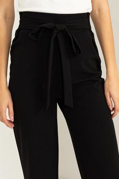 Look no further for a sizzling new look – our "Chic Flair" Cinched Tie Flared Pants are your answer to elevated style. With a high-rise silhouette and a cinched tie waist, these pants boast a fusion of fashion and function that embraces your curves in a flattering, hip-hugging fit. The flared-cut legs add a timeless trendy touch that remains in vogue throughout the seasons, making these pants a versatile addition to your fashion repertoire. Designed for casual elegance, the solid print and tie f