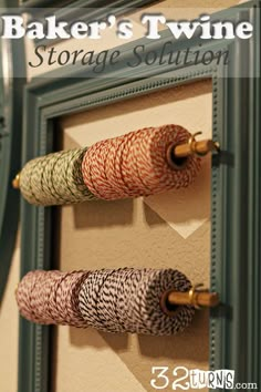 the baker's twine storage solution is hanging on the wall