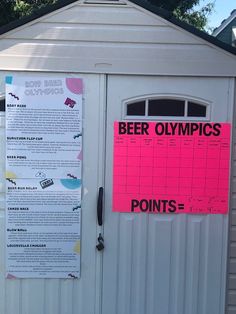 a sign on the side of a building that says beer olympics points