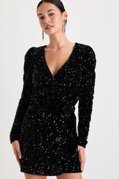 We recommend pairing your sparkly personality with the Lulus Glowing Muse Black Sequin Velvet Long Sleeve Wrap Mini Dress! Dazzling black sequins dance across this velvet dress that features long sleeves with puffy shoulders and a flirty surplice bodice (with a hidden modesty clasp). The flattering wrap silhouette secures with adjustable tying sashes at the side, atop an overlapping skirt that finishes at a sultry mini hem. Fit: This garment fits true to size. Length: Mid-thigh. Size medium measures 33.75" from shoulder to hem. Bust: Great for any cup size. Waist: Fitted - very fitted at natural waist. Hip: Not Fitted - room for hips. Undergarments: May be worn with any standard bra. Fabric: Fabric has some stretch. Lined. Shell: 100% Polyester. Lining: 94% Polyester, 6% Spandex. Hand Wash Monte Carlo Party, Flowy Fashion, Hd Makeup, Reception Outfit, 2025 Wedding, Wrap Mini Dress, December Wedding, Long Sleeve Wrap Dress, Lulu Fashion