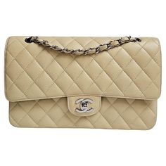 Beatiful classic chanel medium flap in pastel yellow color (almost lighter beige-like) with silver hardware. Series #11 from mid 2000s. Overall still in very good condition. Comes with its holo, card and replacement dust bag. Beige Formal Bags With Double Flap, Classic Beige Double Flap Bags, Beige Double Flap Bag For Formal Occasions, Formal Beige Bags With Double Flap, Formal Beige Double Flap Bags, Classic Beige Shoulder Bag With Double Flap, Classic Beige Double Flap Shoulder Bag, Elegant Beige Double Flap Bag, Everyday Beige Flap Bag With Cc Turnlock Closure