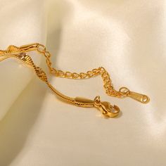 Discover Elegance with Our Minimalist Snake Chain Bracelet Introducing the perfect blend of luxury and durability: our 18k Gold Plated Stainless Steel Snake Chain Bracelet. Crafted with precision and designed for those who appreciate understated elegance, this bracelet is a versatile accessory suitable for any occasion, from gala events to casual gatherings. Key Features & Craftsmanship This exquisite piece features a minimalist snake chain design that offers both comfort and style. Made from hi Elegant Metal Charm Bracelet With Snake Chain, Gold Charm Bracelet With Adjustable Chain, Rose Gold Plated Bracelets With Adjustable Chain, Adjustable Gold Charm Bracelet Tarnish Resistant, Elegant Metal Snake Chain Bracelet, Elegant Gold Snake Chain Bracelets, Elegant Gold Bracelet With Snake Chain, Gold Bracelet With Extender For Formal Occasions, Yellow Gold Chain Link Jewelry With Extender