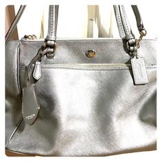 This Is Amazing! So Many Pockets ( See Photos) Large Luxury Silver Shoulder Bag For Travel, Silver Bags With Handles For Daily Use, Daily Use Silver Bags With Handles, Everyday Silver Bags With Double Handle, Silver Travel Shoulder Bag, Luxury Silver Bag For Travel, Luxury Silver Travel Bag, Formal Silver Shoulder Bag With Double Handle, Silver Shoulder Bag With Removable Pouch And Double Handle