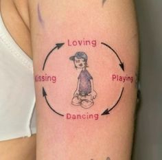 a woman with a tattoo on her arm that says loving, playing, and dancing