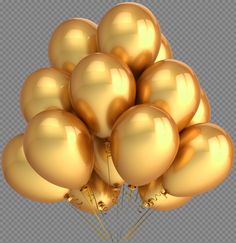 a bunch of shiny gold balloons floating in the air