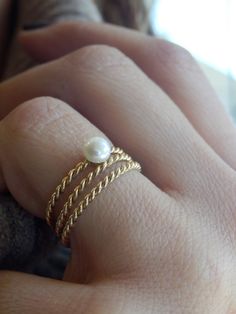 This elegant ring is a handmade ring from 14k solid gold . It is a modern and timeless ring that will never go out of style. You can wear it with other rings on one finger or as one of many rings on different fingers Also you can offer it as birthday gift ( as Pearl is June birthstone) as Bridesmaid Gift or wear it as Bridal Wedding Ring. If you don't know your ring size: you may stop at any jewelry store to have your ring size taken or visit one online ring size guide Please note that finger si Elegant Handmade Yellow Gold Stackable Rings, Yellow Gold Stackable Pearl Ring For Anniversary, Elegant Hypoallergenic Stackable Rings For Anniversary, Classic Handmade Stackable Rings For Anniversary, Delicate Pearl Rings For Gifts, Handmade Classic Stackable Rings For Anniversary, Elegant Hypoallergenic Pearl Promise Ring, Gold Stackable Pearl Ring For Anniversary, Elegant 14k Gold Stackable Pearl Ring