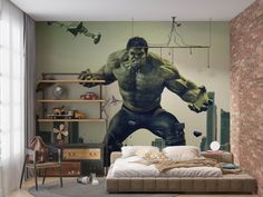 a bedroom scene with the hulk wall mural