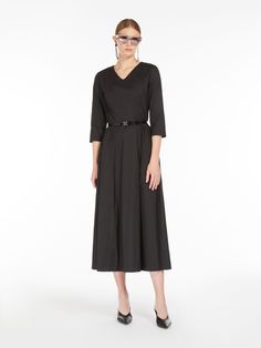 Find MAX MARA Stretch Cotton Dress on Editorialist. Stretch cotton poplin midi dress, featuring a feminine silhouette with a fitted bodice and flared skirt with vertical seams at the front, a seam at the waist and side inset pockets. Featuring a V neck and three-quarter sleeves. Invisible zip fastening on the back. Feminine Silhouette, Invisible Zip, Bustiers, Flared Skirt, Black Midi Dress, Fitted Bodice, Max Mara, Three Quarter Sleeves, Quarter Sleeve