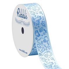 a roll of blue ribbon with animals and letters on the side, in front of a white background