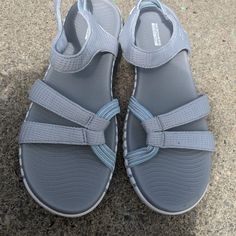 Nwot Skechers Goga Max Grey Sandals Size 9m Pure Comfort Gray Non-slip Flat Sandals, Non-slip Flat Gray Sandals, Gray Flat Sandals For The Beach, Casual Closed Toe Gray Sandals, Casual Gray Closed Toe Sandals, Gray Non-slip Sandals With Round Toe, Gray Non-slip Round Toe Sandals, Comfortable Gray Slip-on Sandals, Gray Non-slip Open Toe Sport Sandals