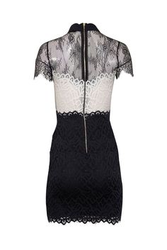 Add a touch of charm to your wardrobe with Sandro's lovely lace dress. This elegant piece features a sophisticated two-tone design with romantic scalloped details. The peter pan collar and dainty bow add a playful touch, while the fitted silhouette and semi-sheer neckline add a sultry touch. Complete the look with black and white slingback heels. Size XS (FR 34) Main 72% Nylon, 17% Polyester, 11% Elastane Ribbon 100% Polyamide Lining 100% Polyester Exposed back zip closure Short sleeves Semi-sheer lace sleeves and neckline Peter pan collar w/ ribbon tie Scalloped details Bust 30" Waist 24" Shoulder to hem 34" Elegant Mini Lace Dress With Lace Trim, Fitted Lace Dress With Lace Trim For Date Night, Elegant Evening Dresses With Scalloped Edges, Fitted Evening Dress With Contrast Lace, Elegant Lace Dress With Scalloped Edges For Evening, Elegant Evening Lace Dress With Scalloped Edges, Feminine Fitted Dress With Scalloped Lace, Feminine Fitted Lace Dress With Scalloped Detail, Elegant Mini Lace Dress With Lace Patchwork