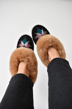 Beautiful, unique, traditional, 100% handmade sheepskin moccasins slippers are made from natural leather and sheep wool. Small leather pieces and sheepskin leftovers are turned into beautiful and one of a kind home shoes. Our slippers are very soft and comfortable. Perfect on rheumatic pain and are hypoallergenic. Outer: sheepskin; Sole: harden suede leather ( will soften after 2-3 days) Insole: wool lining Please note - because of handmade nature of this slippers colour shade, or thread might differ a liitle bit. Sheepskin Slip-on Slippers For Fall, Winter Leather Moccasins With Rubber Sole, Winter Sheepskin Slippers With Rubber Sole, Brown Slip-on Moccasins For Winter, Brown Sheepskin Slippers For Fall, Sheepskin Slippers With Rubber Sole And Round Toe, Winter Sheepskin Moccasins With Round Toe, Sheepskin Slippers With Leather Sole And Round Toe, Brown Sheepskin Slippers With Leather Sole