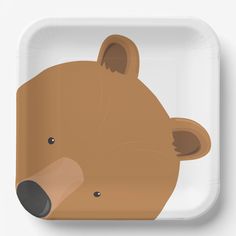 a paper plate with a brown bear on it