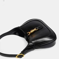 Black Classic Curved Leather Handbag with Signature Buckle Closure Leather Making, Classic Handbags, Shoulder Messenger Bag, Metal Buckles, A Signature, Leather Handbag, Timeless Classic, Leather Handbags, Messenger Bag