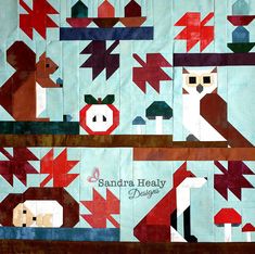 a quilted wall hanging with animals and birds on it's sides, along with the words sandara healy designs