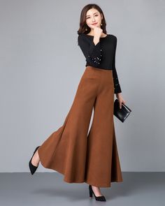 * A cool flare skirt pants, made of quality cotton blends. * Two pockets, they are big enough for your hands. * Material: 6% cotton, 90% polyester, 4% spandex * Let us know your usual size in your country and your overall height. * Can custom make waist size and length. * Size: True to US size, US 0-US 20 are available, you can let us know your usual size and height in your order. * Shipping: Free shipping Processing time : 5-7 Business days Delivery time : 7-20 Business days Tracking number ava Chic Brown Cotton Wide Leg Pants, Spring Workwear Bottoms With Flared Hem, Fall Workwear Pants With Flared Hem, Chic Wide Leg Flared Pants For Fall, Chic Wide Leg Pants With Flared Hem For Fall, Chic Cotton Pants With Flared Hem, Plazo Pants With Top, Fitted Wide Leg Pants With Flared Hem For Fall, Fitted Flared Hem Wide Leg Pants For Fall