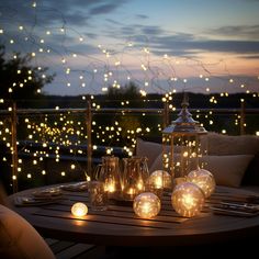 a table with candles and lights on it