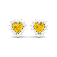 Product Details The Lab Grown Yellow Sapphire Heart Earrings with Diamond is a symbol of eternal love, a dazzling and timeless piece of jewelry that will cherish for a lifetime. The 4 MM heart shape yellow sapphires, grown in a sustainable lab environment, are set against as a center stone, creating a look that is both romantic and luxurious. The center stone is surrounded by small sparkling diamonds. These earrings are the perfect gift for a loved one on any occasion, whether its a birthday, an Sapphire Earrings, Yellow Sapphire, Eternal Love, Sparkle Diamonds, Heart Earrings, Birthday Anniversary, Heart Shape, Prong Setting, Timeless Pieces