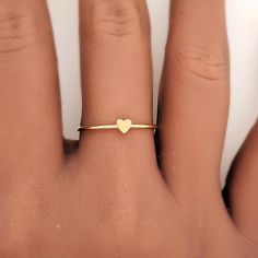 Mother's Day Gift | Small Heart Ring This dainty heart ring includes a 2.5mm heart attached to a 1mm band.  It is the perfect minimal heart ring.  Each ring is made from either 14K rose gold filled, 14K yellow gold filled, or sterling silver wire. Please read our policies before purchase. Connect with us on social media @ShopGoingGolden H Ring Letter, Minimal Ring Design For Women, Dainty Heart Cut Birthstone Ring, Simple Heart-shaped Stackable Promise Rings, Dainty Stackable Heart Cut Rings With Heart Charm, Dainty Heart Cut Stackable Rings With Heart Charm, Delicate Heart-shaped Stackable Promise Rings, Minimalist Heart Shaped Stackable Promise Rings, Tiny Delicate Heart Promise Ring