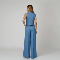 Introducing our Skye Silk Crepe Pants, a statement of luxurious comfort and timeless style. Tailored from  blue silk crepe with a wide-leg cut, they feature expertly placed darts that contour the waist and flatter the silhouette. The pressed crease detail offers a touch of refinement, elevating the overall look with understated polish. A concealed zipper and hook fastening in the front ensures a seamless finish, while the inclusion of pockets adds a practical yet chic element to the ensemble.  M Blue Skye, Crepe Pants, August Birthstone Jewelry, July Birthstone Jewelry, Gifts For New Mums, Pearl Jewellery Earrings, Jewelry Ring Box, Natural Silk, August Birth Stone