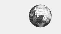 a mirror ball is shown against a white background