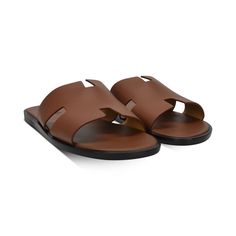 Hermes 'Oran' Sandals in brown leather with a black sole. Includes dust bag and box. Brand = Hermes Condition = 9/10, like new Size= 42.5 Material = Leather SKU = 17595-1 Hermes Sandals, Hermes Oran Sandals, Tan Sandals, Mens Slides, Hermes Oran, Hermes Men, Mens Luxury, Brown Sandals, Mens Sandals