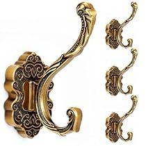 an ornately designed door handle and knob set