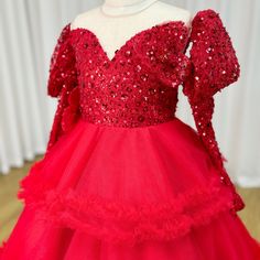 Dress your little princess in our elegant DreamyVow Red Girl Dress, featuring long sequined sleeves for a touch of sparkle. Perfect for birthdays and weddings, this gown is sure to make her feel like royalty. Made with high-quality materials, it offers both style and comfort. Get ready to make memories! Red Gown For Pageant During Prom Season, Red Princess Gown For Prom Season, Red Princess Gown For Prom, Princess Style Red Ball Gown For Prom Season, Red Princess Ball Gown For Prom, Princess Style Long Sleeve Pageant Dress For Wedding, Long Sleeve Princess Pageant Dress For Wedding, Red Princess Dress For Wedding, Princess Style Red Party Gown