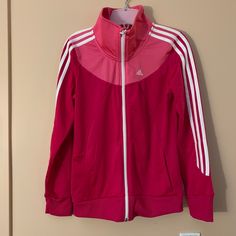 Brand New Unused Adidas Track Jacket Girls Size 13-14, Women Firs For Size 2-4 Pink Adidas Sports Outerwear, Pink Adidas Sporty Outerwear, Sporty Pink Adidas Outerwear, Pink Adidas Long Sleeve Outerwear, Adidas Pink Long Sleeve Outerwear, Pink Adidas Winter Outerwear, Pink Adidas Track Jacket For Spring, Adidas Pink Track Jacket For Spring, Adidas Track Jacket