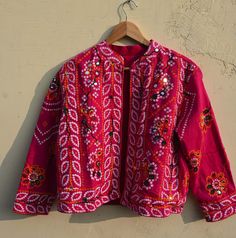 Indian Ethnic Jacket Embroidered Vintage stylish designer jacket for women  This is made of cotton fabric with some unique stylish embroidery and printed. A unique combination embroidery. This jacket is perfect for every traditional functions or parties this gives you a very attractive look. Size : L Length : 21 Inches Chest : 40 Inches Sleeve Length : 20 Inches Free Worldwide Shipping IMP NOTE: The colour of Picture shown above may slightly vary due to flash light, Screen and camera-resolution. Long Sleeve Multicolor Embroidered Choli, Embroidered Multicolor Long Sleeve Choli, Multicolor Embroidered Long Sleeve Choli, Embroidered Long Sleeve Choli For Navratri, Festival Long Sleeve Choli With Motifs, Traditional Long Sleeve Choli For Spring, Festive Long Sleeve Choli For Festivals, Bollywood Style Long Sleeve Nehru Jacket With Mirror Work, Festive Outerwear With Woven Motifs