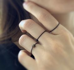 "Super chic, simple and unique! Available in 13 different colors! Makes a unique promise or pre-engagement ring for your exciting new journey! ♥︎ USA - Quick shipping 3-5 working days with tracking for only $5.95! ♥︎ D E T A I L S FEATURES: -Water resistant -Color does not fade easily -Adjustable -Comfortable to wear -Super unique! GEMSTONE AVAILABLE: -Clear quartz -Goldstone -Tiger Eye -Black Onyx -Amethyst -Each stone measures between 3-4mm MATERIAL: -Nylon string -Less than .8mm thick -Thicke Simple Adjustable Promise Rings, Modern Adjustable Midi Rings For Promise, Adjustable Simple Design Rings For Promise, Modern Adjustable Stackable Promise Rings, Adjustable Stackable Rings With Simple Design As Gift, Adjustable Simple Midi Rings For Promise, Adjustable Simple Stackable Rings For Promise, Simple Adjustable Rings With Ethical Gemstones, Adjustable Black Midi Rings For Gift