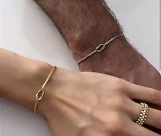 Description:   Love Knot Bracelet - Dainty Couple Bracelets -İnitial Bracelet - İnfinity Bracelet -  Sterling Silver Friendship  Jewelry - Best Friend Gift -  Gift for Couples - Love Knot Bracelet -   Personalized Bracelet   - Couples Jewelry   - Gift for mom - Love Knot Bracelet  -  Couple Bracelet -  Boyfriend Girlfriend Matching - Unisex Bracelet -  Love Knot Soulmate - Couples Bracelet - Birthday Gift - Bridesmaid Gift - Anniversary Gift - Valentines Gift -  --Our product is produced with care from 925 carat high quality silver. Snake chain is used in double bracelets. Our Bracelets:       Bracelet Length : 6.8 inch + 2 inch Extension ring (17 CM+5 CM)                       *Love Knot Necklace :16 İnch + 2 İnch Extension Ring     (40 CM+5 CM) -It is suitable for daily use. -All your or Him And Her Bracelets, Couples Permanent Bracelets, Promise Bracelet For Couples, Boyfriend Bracelet Couples, Engagement Bracelets, Matching Boyfriend, Boyfriend Jewelry, Matching Jewelry For Couples, Love Knot Bracelet