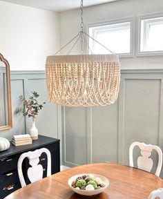 a dining room table with a bowl of food on it