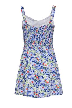 For the girls that just can't get enough floral print into their wardrobes, this Joie mini dress is for you! This feminine print is filled with blue flowers that make this a wonderful option for a day out at your local fair. Slip on a pair of comfy sandals to keep with the casual aesthetic of this dress and enjoy this breezy summer frock. Size L Shell: 100% Silk Lining: 100% Polyester Concealed back zipper Partially lined Fit and flare silhouette V-neckline Sleeveless Smocking detail at back Bus Blue Floral Print Mini Dress, Summer Floral Print Blue Dress, Blue Mini Floral Dress For Summer, Blue Mini Floral Summer Dress, Blue Floral Mini Dress For Summer, Blue Sleeveless Mini Dress For Garden Party, Blue Printed Mini Dress For Spring, Blue Printed Mini Dress For Summer, Blue Floral Print Mini Dress For Summer