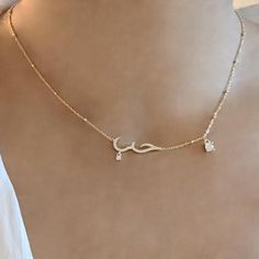 This Arabic Love Necklace features the word for 'love' in Arabic which translates to Hubb حب. It features a dainty gold chain with high quality square cubic zirconia crystals. Pair this up with our matching Arabic Love Bracelet for a complete look. We make our jewellery in small batches to reduce wastage. Our jewellery is designed with the modern Woman in mind, elegant, unique pieces with a classic touch. This is our most popular necklace and is great for gifting, whether it's Valentines, Mothers Day, Birthday Christmas or simply a gift for a friend, sister etc. 14ct gold plating on 925 sterling silver 35+10 CM Meaningful Christmas Gifts, Arabic Necklace, Dainty Gold Chain, Meaningful Christmas, Popular Necklaces, Dainty Gold Necklace, Love Bracelet, Gold Necklace Women, Wedding Jewellery Necklace