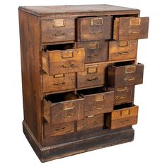 an old wooden chest with many drawers