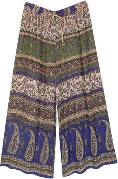 An ethnic bohemian pants with a wide leg flare - a must-buy palazzo pants because of its unique traditional style - great pajama street wear for travel.  There are different motifs, including folk paisley, printed in various sections of the pants. #tlb #vacationclothing #beachwrap #Floral #Paisley #bohemianfashion #Indian #PalazzoPants #StreetWearPajama Paisley Print Wide Leg Vacation Pants, Bohemian Paisley Print Summer Pants, Bohemian Paisley Print Pants For Vacation, Bohemian Summer Pants With Paisley Print, Bohemian Paisley Print Vacation Pants, Bohemian Spring Pants With Paisley Print, Bohemian Long Pants With Paisley Print, Bohemian Bottoms With Paisley Print, Bohemian Wide-leg Paisley Pants